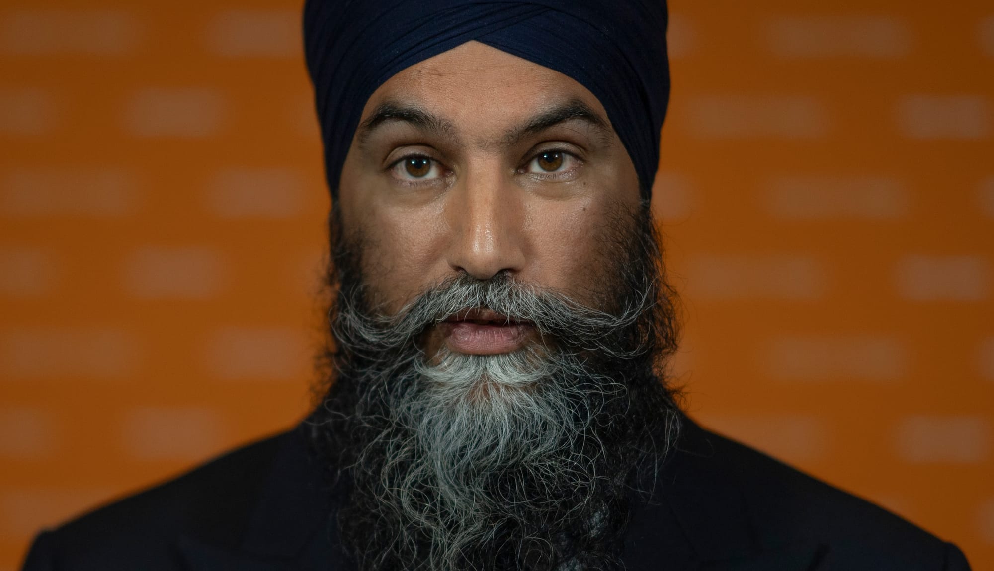 Jagmeet Singh looking slightly to the side of the camera. 