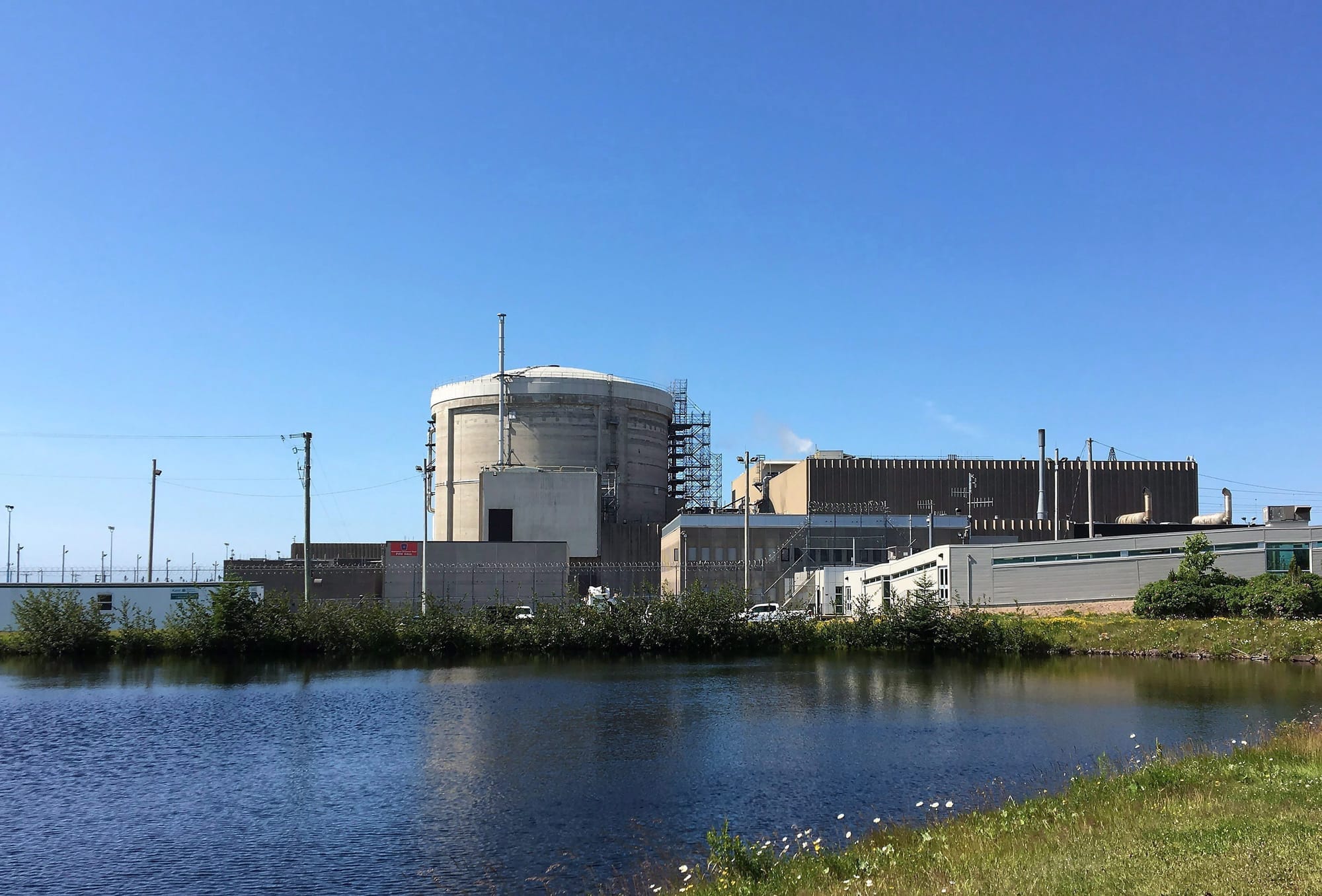 Grey buildings that comprise the Point Lepreau nuclear site