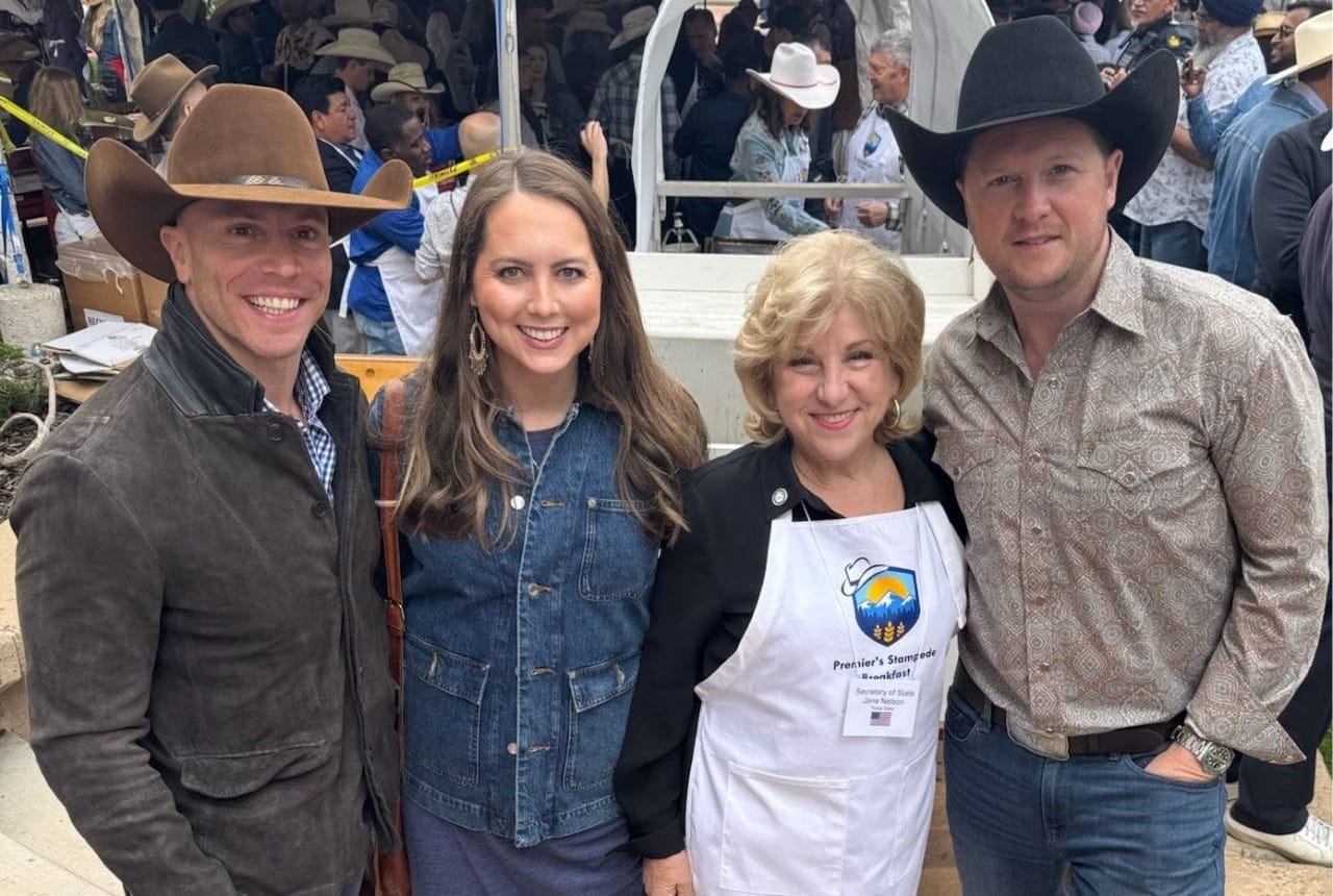 Beacon AI Centers CEO Josh Schertzer poses with Texas Secretary of State Jane Nelson and Alberta Minister of Affordability and Utilities Nathan Neudorf